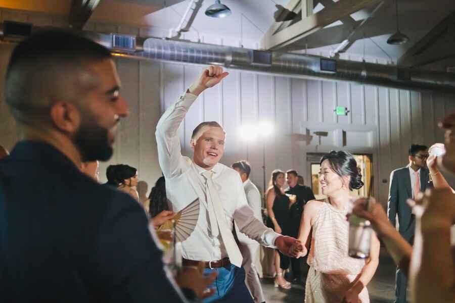 after wedding dancing in the Barn at harrow cellars - onelove photography