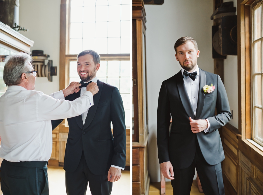 A groom gets dressed and poses in a tux