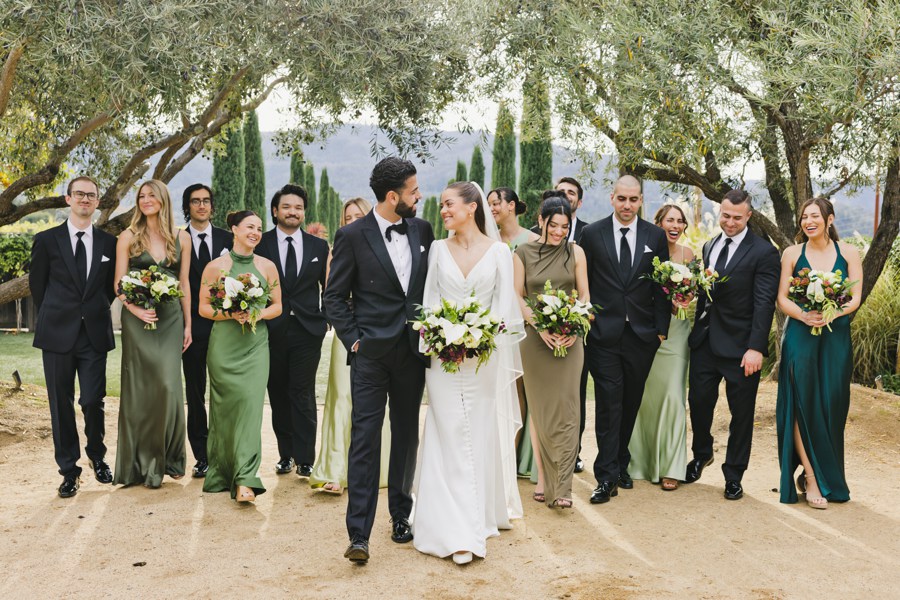 A group of people walking together, celebrating a Brindare Napa Wedding.